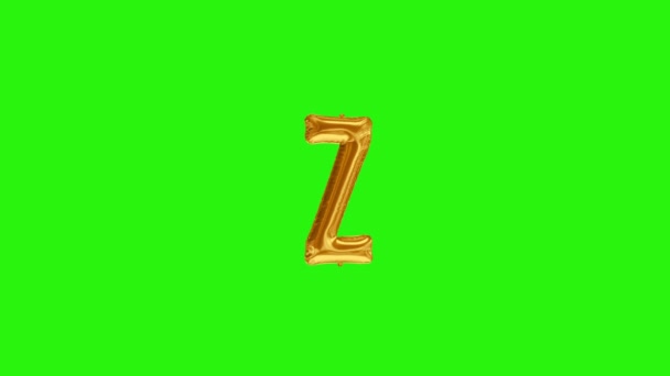 Golden letter Z. Gold foil helium balloon alphabet floating on green screen - 映像、動画