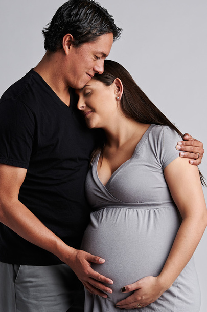 Young pregnant happy couple - Fotó, kép
