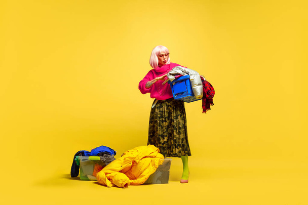 Caucasian womans portrait isolated on yellow studio background, influencer be like - Foto, Imagem