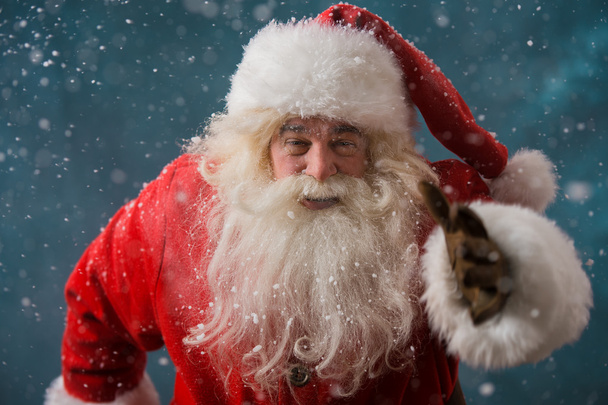Santa Claus running outdoors at North Pole - Fotoğraf, Görsel