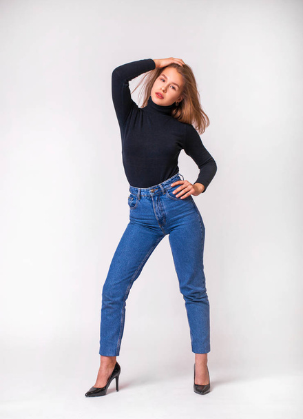 Beautiful girl in blue jeans - Zdjęcie, obraz