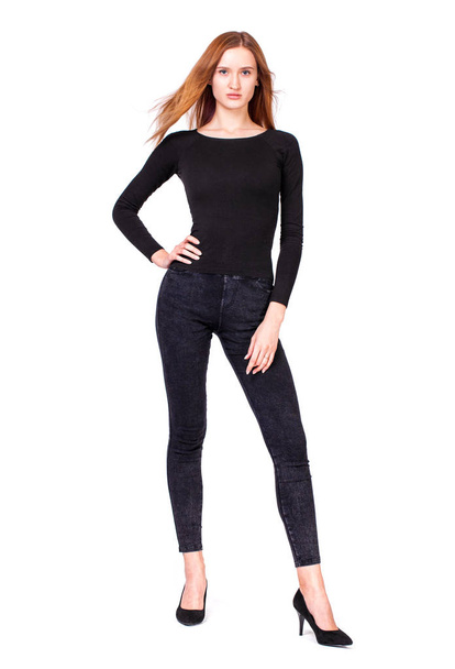 Beautiful sexy woman in black jeans - Фото, изображение
