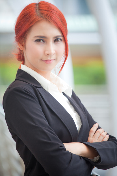 Business woman smiling arms crossed - Photo, Image