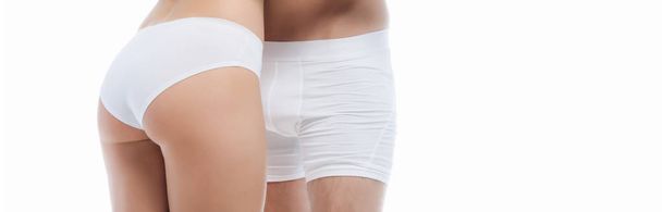 partial view of couple in white underwear, isolated on white, panoramic shot  - Foto, Bild