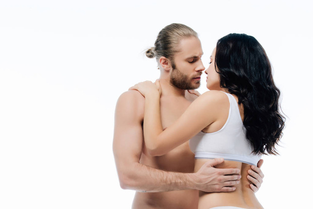 sensual couple hugging in white underwear, isolated on white - Foto, immagini