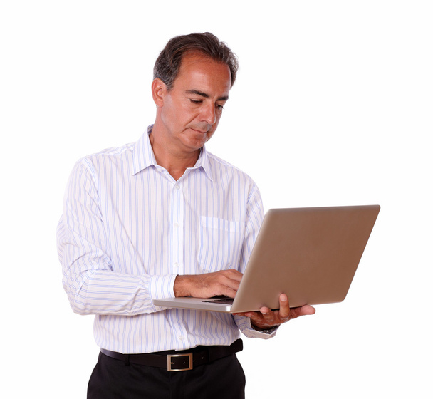Charismatic man working on his laptop - Zdjęcie, obraz