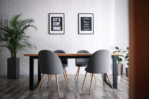 Modern dining room interior with stylish furniture - Foto, Bild