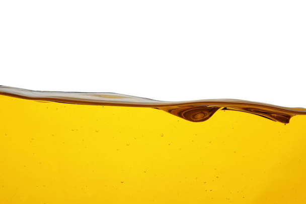 Cooking oil flow isolated on white. Color liquid - Foto, Imagem