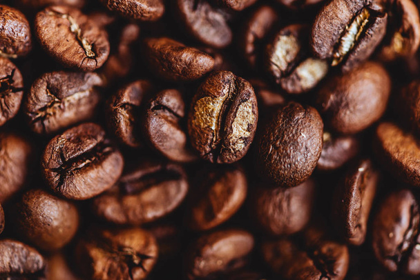 Coffee grains. Background of roasted coffee beans brown. layout. - Foto, afbeelding