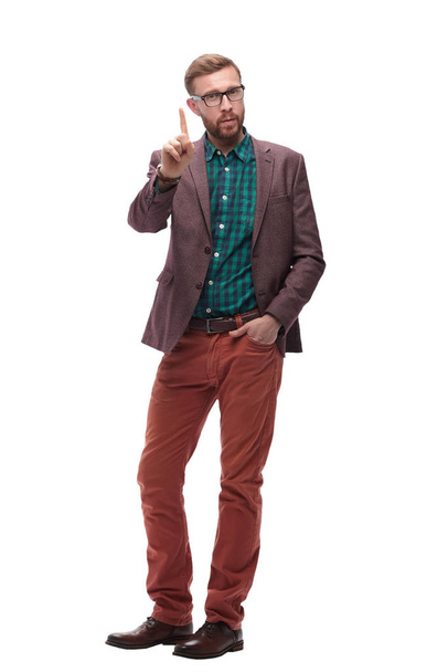 in full growth. serious hipster man showing a gesture of attention . isolated on white - Φωτογραφία, εικόνα