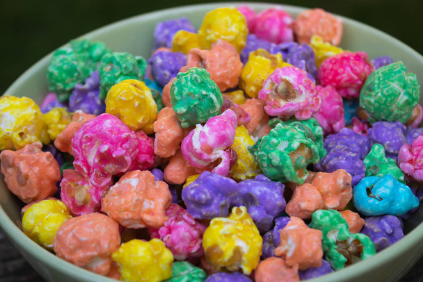 a bowl of bright multi colored popcorn - Photo, Image