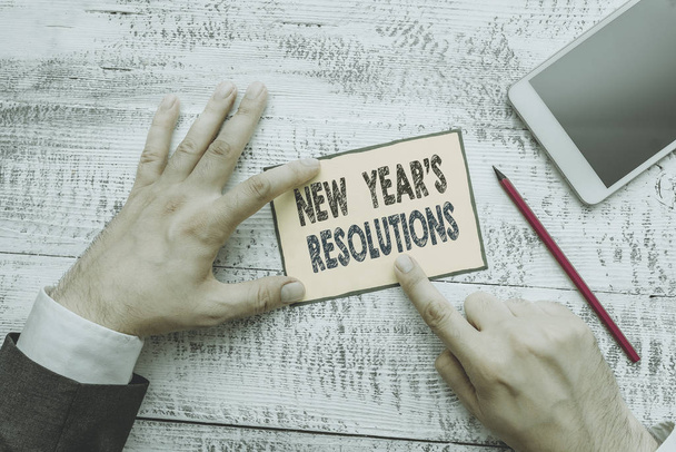 Sana kirjallisesti tekstiä uudenvuoden S päätöslauselmat. Liiketoiminta käsite toivelista Luettelo asioista saavuttaa tai parantaa
. - Valokuva, kuva