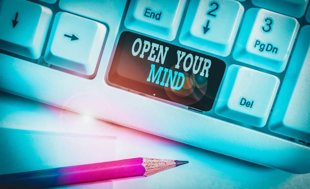 Text sign showing Open Your Mind. Conceptual photo Be openminded Accept new different things ideas situations White pc keyboard with empty note paper above white background key copy space. - 写真・画像