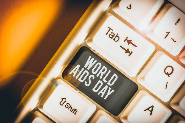 Dünya Yardım Günü 'nü gösteren kavramsal el yazısı. İş fotoğrafı metni 1 Aralık 'ta Aids White Pc klavyesine yönelik farkındalığı artırmaya adanmıştır.. - Fotoğraf, Görsel