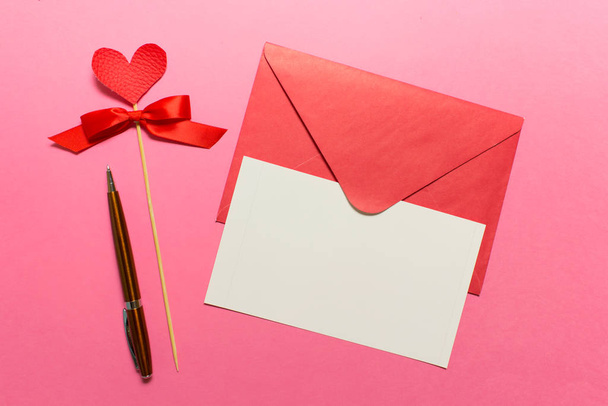 Love message mail with pen, card, heart on pink backgound - Fotoğraf, Görsel