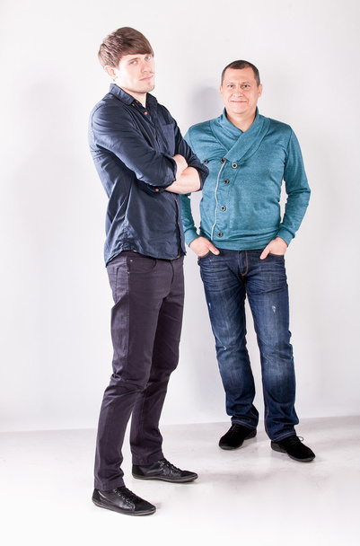 Men posing in studio against white background - Fotografie, Obrázek