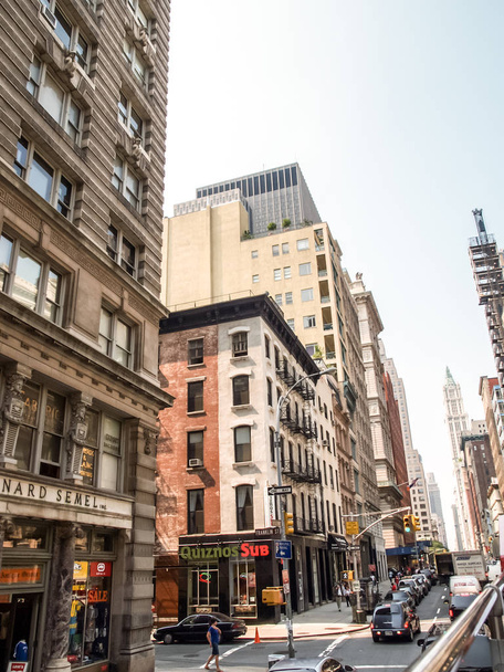 New York street view with modern and old historic buildings - Fotó, kép