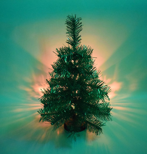 Image of New Year tree glows in green - Φωτογραφία, εικόνα