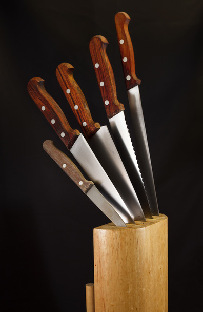 Couteaux de cuisine et leur bloc de bois
 - Photo, image