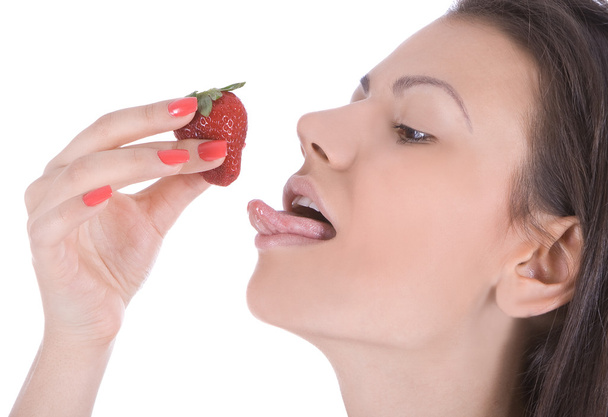 Young woman enjoy strawberry - Foto, Imagen