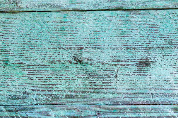 Old weathered wood plank painted in blue. - Фото, изображение