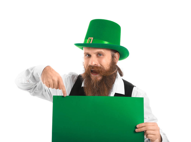 Bearded man with blank poster on white background. St. Patrick's Day celebration - Фото, изображение