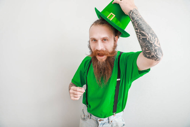 Bearded man on light background. St. Patrick's Day celebration - Fotografie, Obrázek