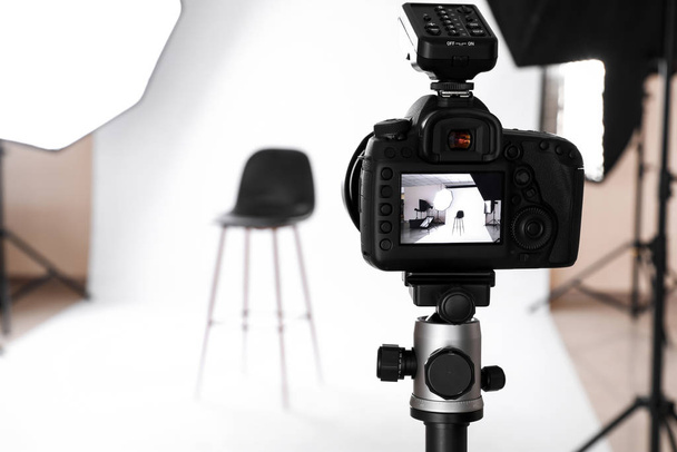 Modern photo camera in professional studio - Photo, Image