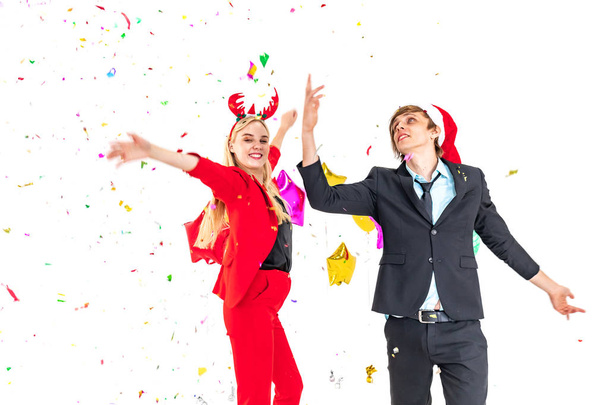 young couple enjoy dance with colorful confetti in new year celebration hangout party - Photo, Image