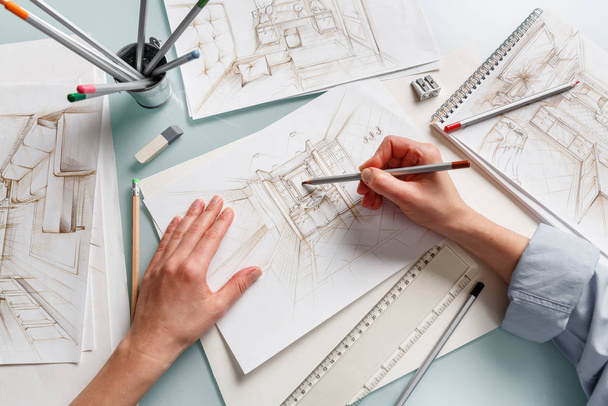 Interior designer making hand drawing pencil sketch of a bathroo - Fotoğraf, Görsel