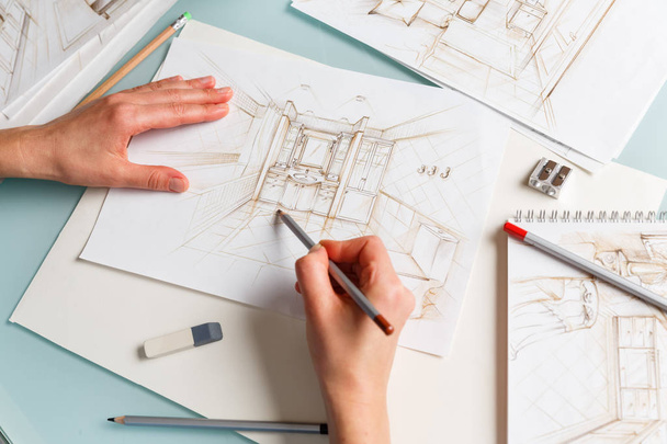 Interior designer making hand drawing pencil sketch of a bathroo - Foto, immagini