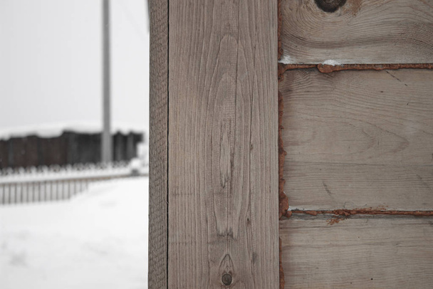 The corner of the wooden house. Close-up. Background. Texture. - Fotó, kép