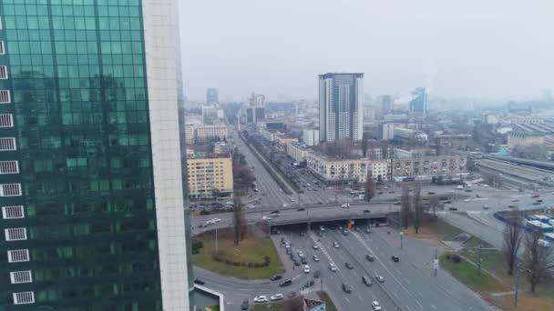 Traffic in a big city. Cars passing through road junction. Aerial view.  4K. - Video, Çekim