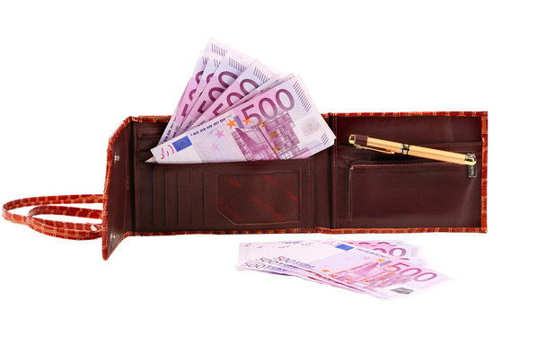Five hundred euro bill in open brown purse. - Foto, Bild