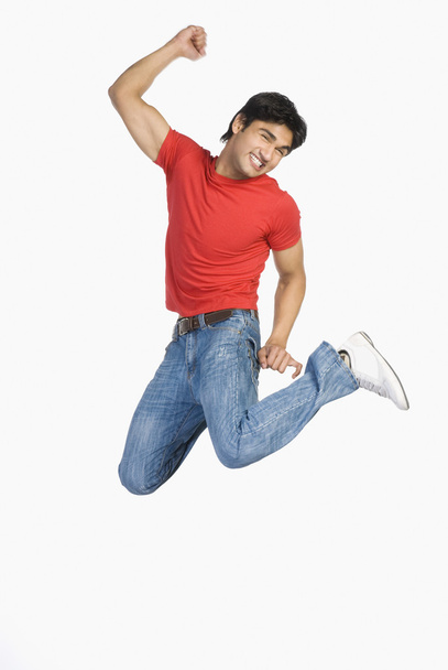 Man jumping in mid-air - Photo, image