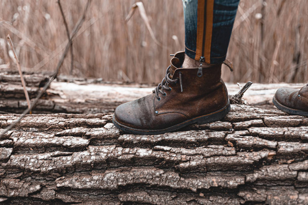 Guy hiking in comfortable hiking boots. Boots close-up stock photo. - Фото, изображение