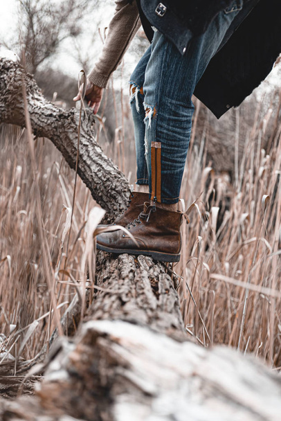 Guy hiking in comfortable hiking boots. Boots close-up stock photo. - Photo, image