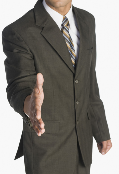 Businessman offering a handshake - Foto, afbeelding