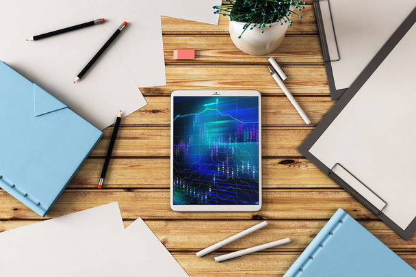 Digital tablet closeup top view with financial graph on screen. Online trading application concept. 3d rendering. - 写真・画像
