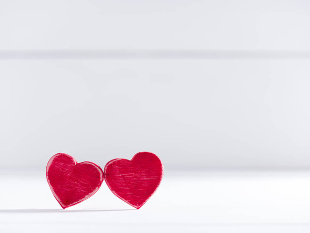 two authentic red wooden hearts  - Fotografie, Obrázek