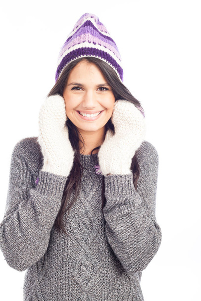 pretty brunette woman with a woolen Peruvian hat a sweater and g - Photo, image