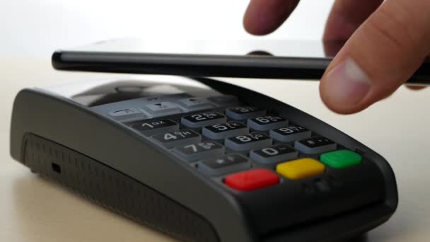 Utiliza el pago sin contacto por teléfono inteligente NFC
 - Imágenes, Vídeo