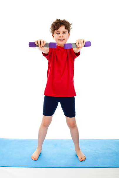 Active boy exercising - Foto, Imagen