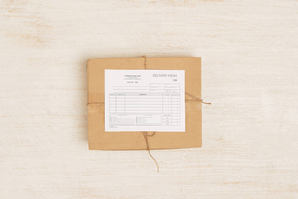Delivery concept. Group of parcels with clipboard, close up  - Photo, Image
