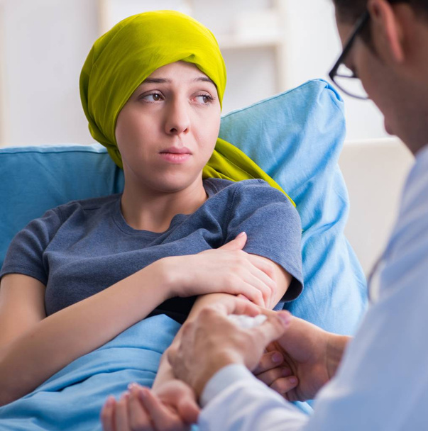 Cancer patient visiting doctor for medical consultation in clini - Photo, Image
