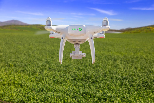 Drone Unmanned Aircraft Flying and Gathering Data Over Country Farmland - Photo, Image