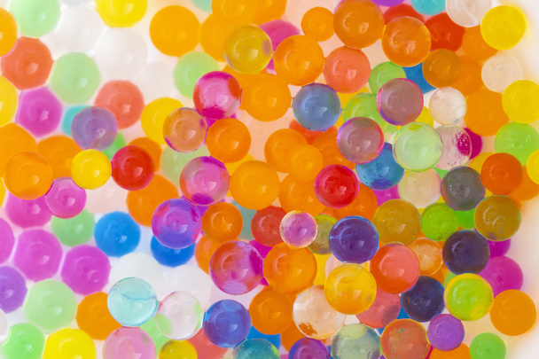 Kleurrijke groeiende waterballen achtergrond - Foto, afbeelding