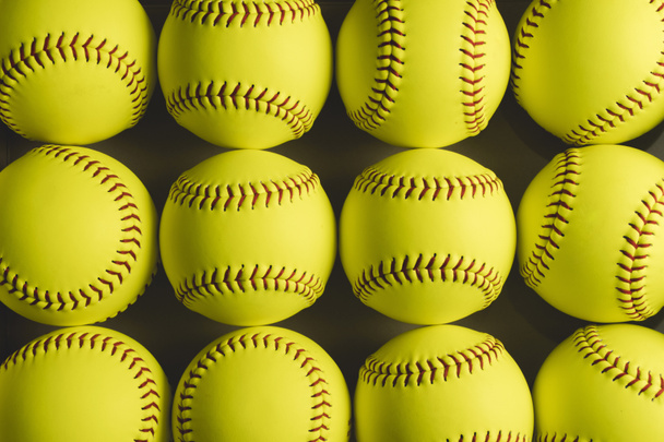 Fastpitch softball balls background close ups.  - Foto, imagen