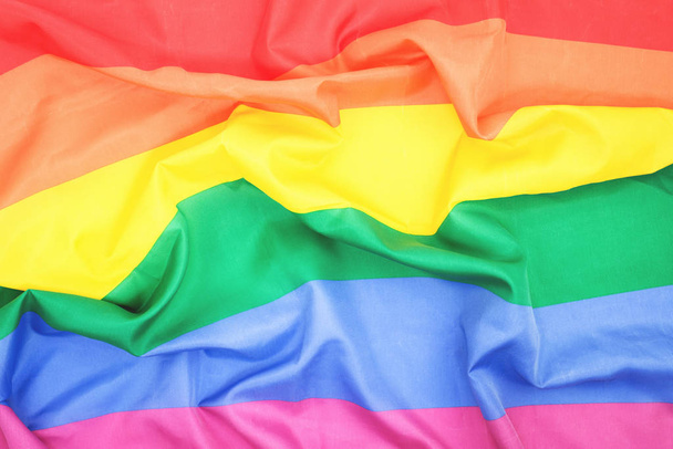 LGBTQ pride creased rainbow flag top view - Fotografie, Obrázek