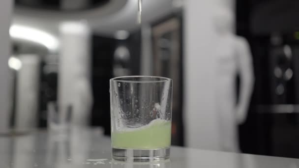 Drunk man pours alcohol past the glass - Felvétel, videó